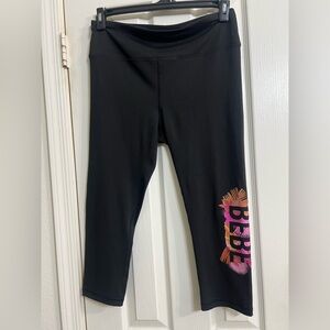 Bebe sport tropical logo Black capris with Graphic print on the lower leg size L
